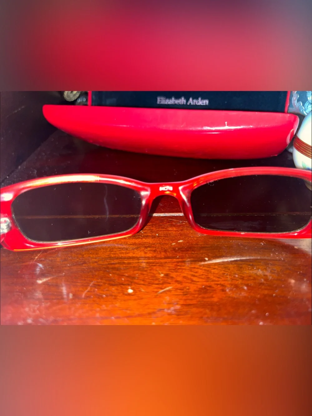 Elizabeth Arden Black Rectangular Sunglasses with Red Accents